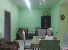 emircan kolyaninn dukanina yaxin